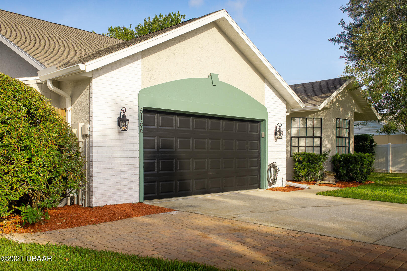 6166 Del Rio Drive Port Orange, FL 32127 - Photo 40 of 53 a front view of a house with a yard