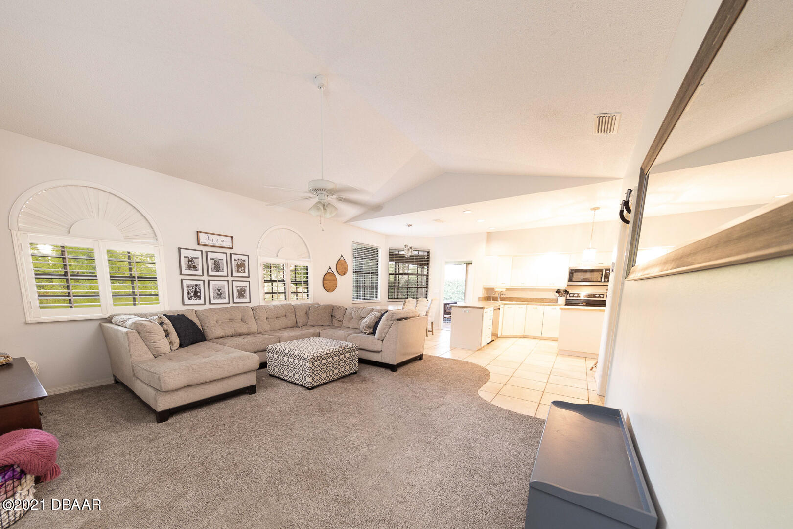 6166 Del Rio Drive Port Orange, FL 32127 - Photo 8 of 53 a living room with furniture and a large window