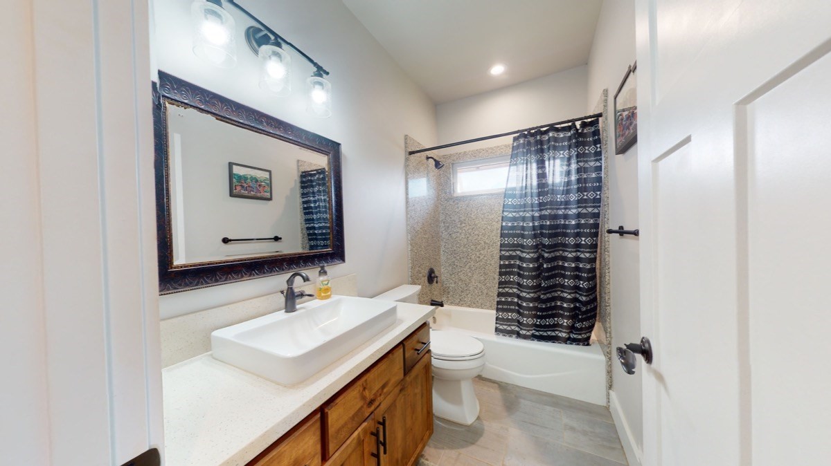 4592 A Awawa Road Hanapepe, HI 96705 - Photo 16 of 24 a bathroom with a sink toilet and shower