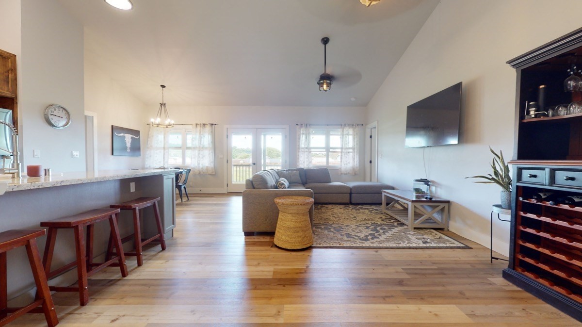 4592 A Awawa Road Hanapepe, HI 96705 - Photo 6 of 24 a living room with furniture and a flat screen tv