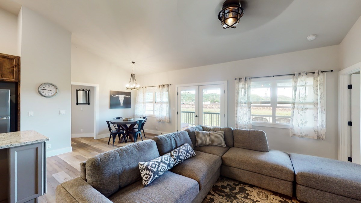 4592 A Awawa Road Hanapepe, HI 96705 - Photo 7 of 24 a living room with furniture and a large window