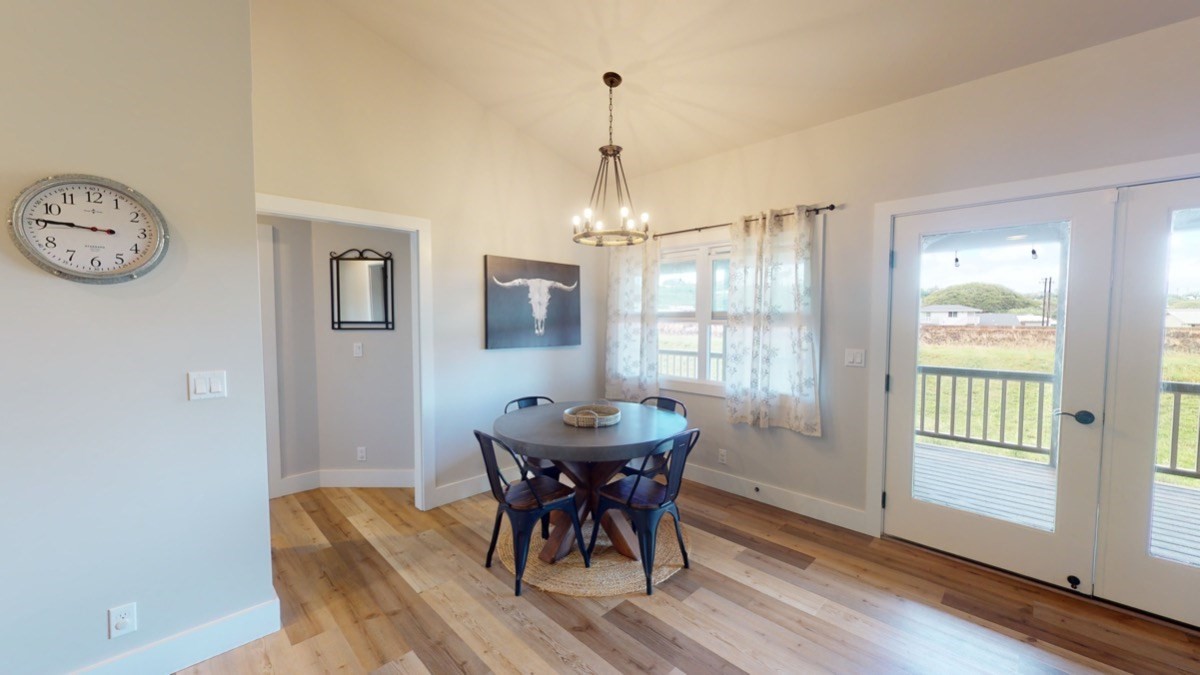 4592 A Awawa Road Hanapepe, HI 96705 - Photo 9 of 24 a dining room with furniture window and wooden floor