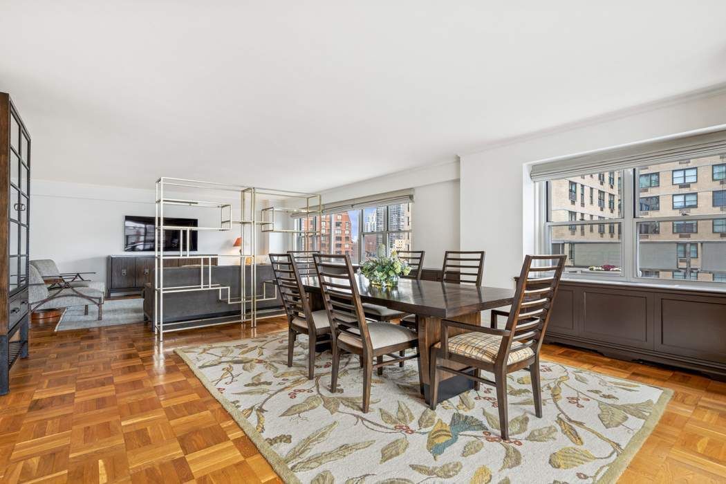 301 East 75th Street, Unit 19B Manhattan, NY 10021 - Photo 7 of 21 a view of a dining room with furniture
