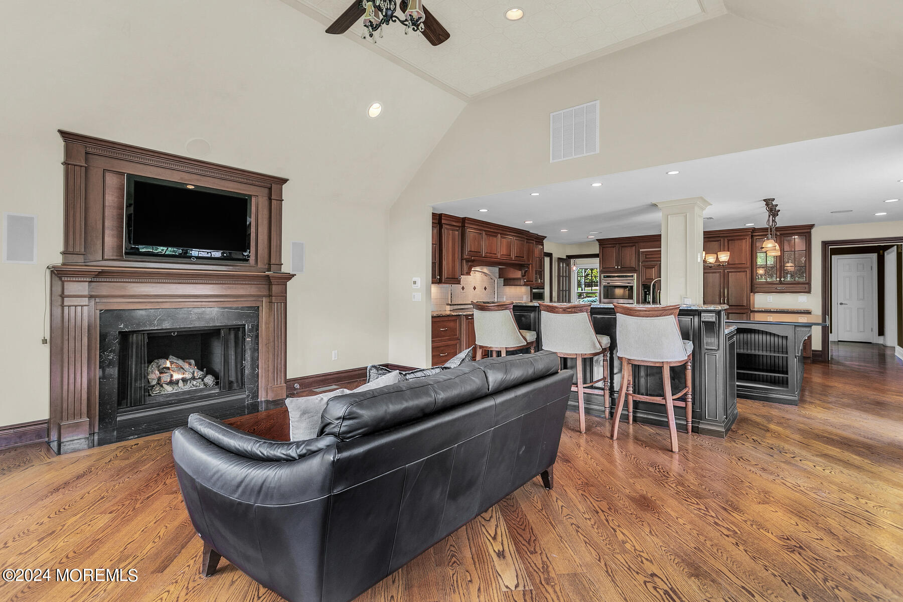 44 Meadowview Drive Colts Neck, NJ 07722 - Photo 20 of 68 a living room with furniture and a fireplace