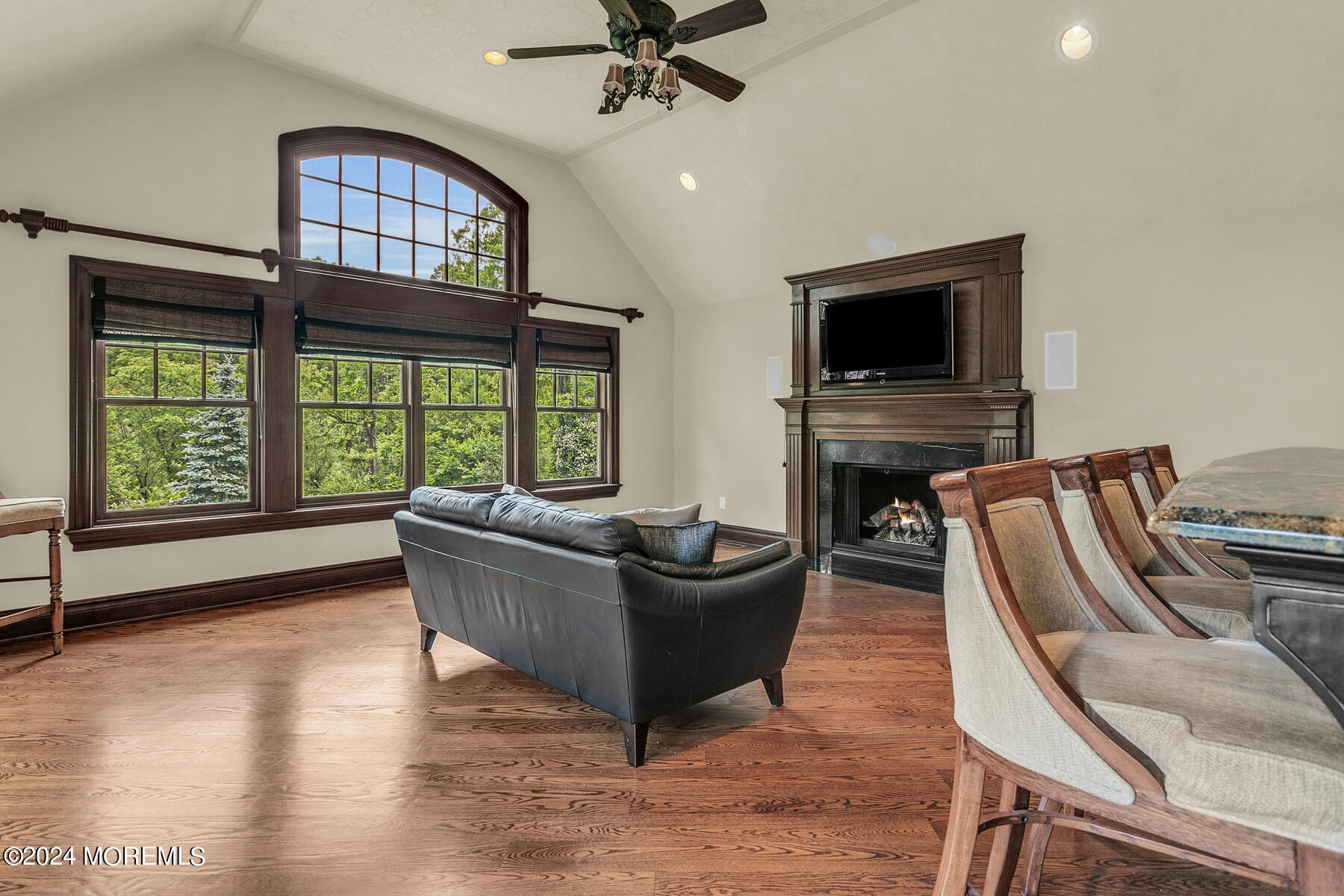 44 Meadowview Drive Colts Neck, NJ 07722 - Photo 23 of 68 a living room with furniture and a flat screen tv