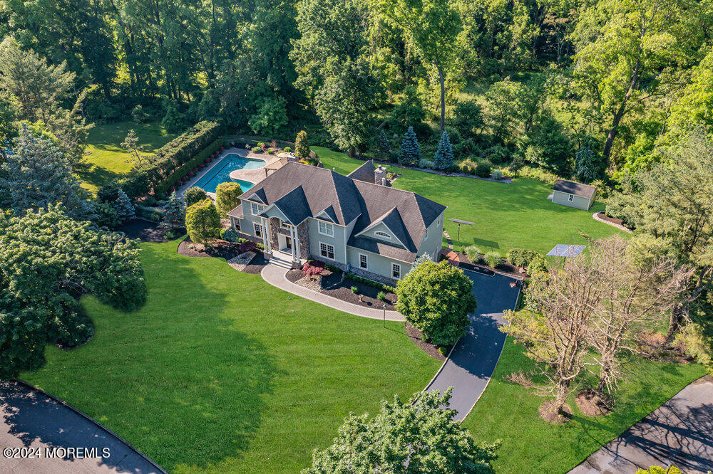 44 Meadowview Drive Colts Neck, NJ 07722 - Photo 3 of 68 an aerial view of a house with a yard