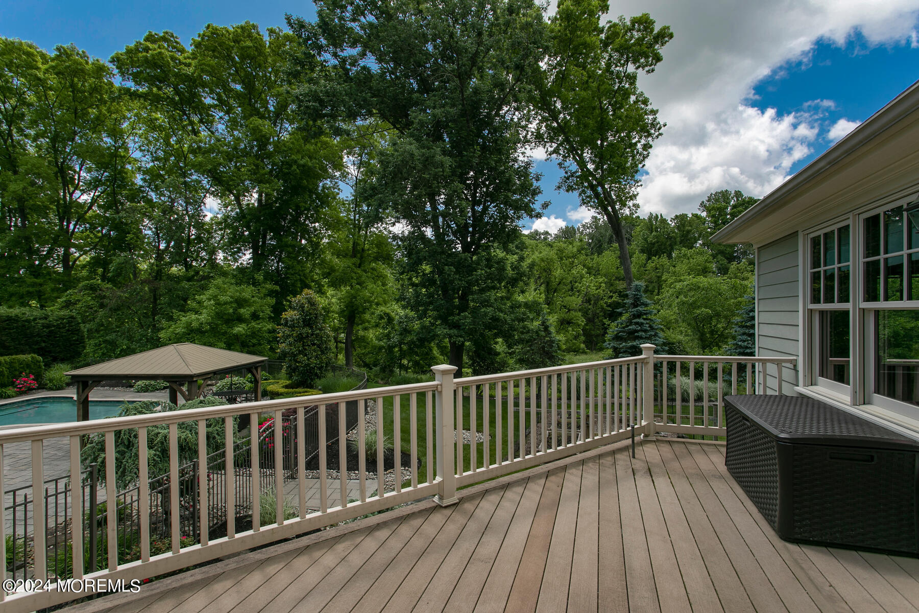 44 Meadowview Drive Colts Neck, NJ 07722 - Photo 59 of 68 a view of balcony with wooden floor and fence