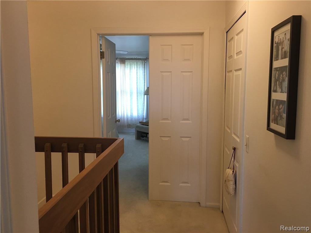 629 Summit Ridge Drive, Unit 13 Milford, MI 48381 - Photo 31 of 59 DOUBLE DOORS INTO MASTER