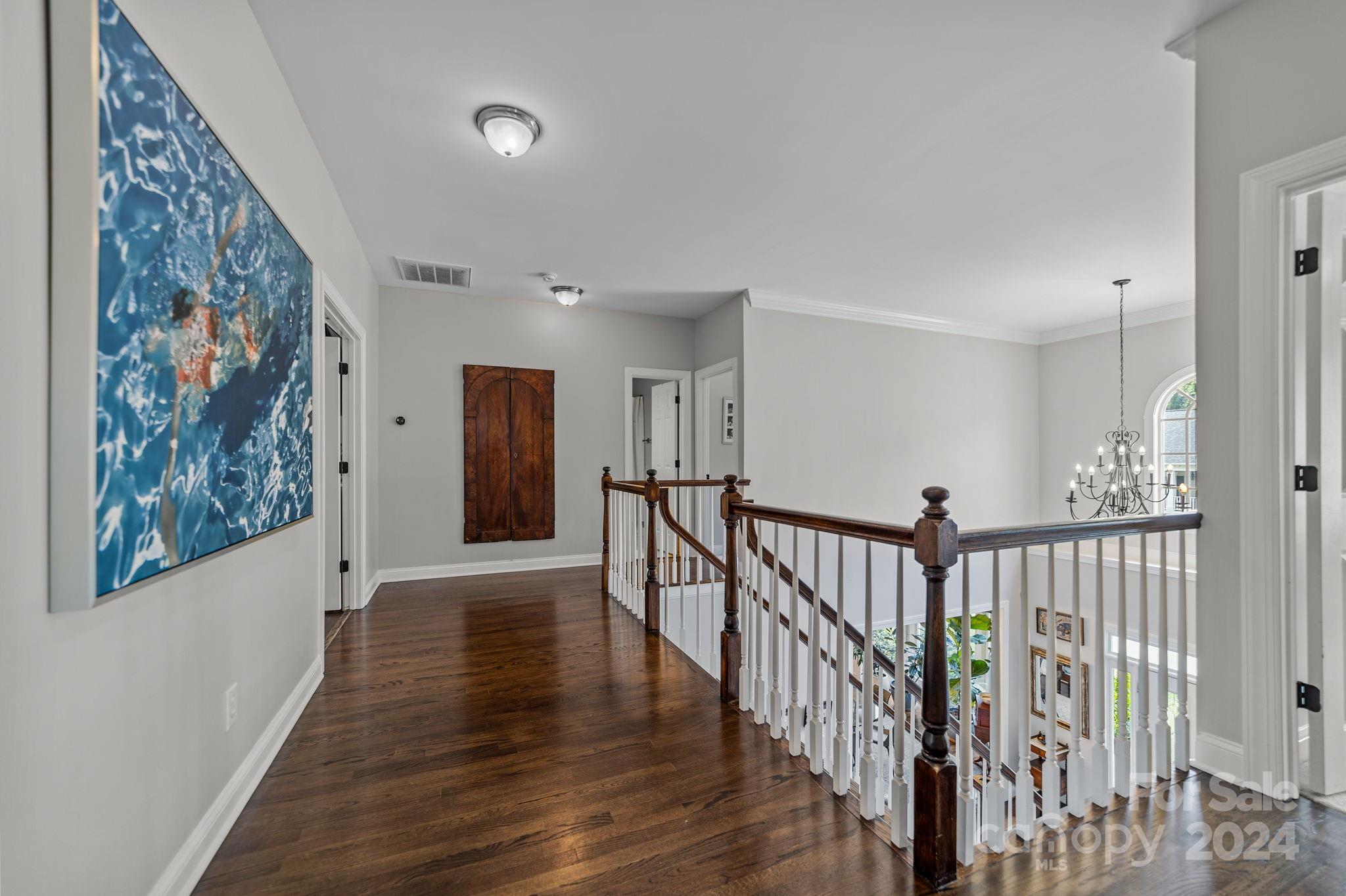 20443 Middletown Road Cornelius, NC 28031 - Photo 18 of 31 a view of gallery with wooden floor