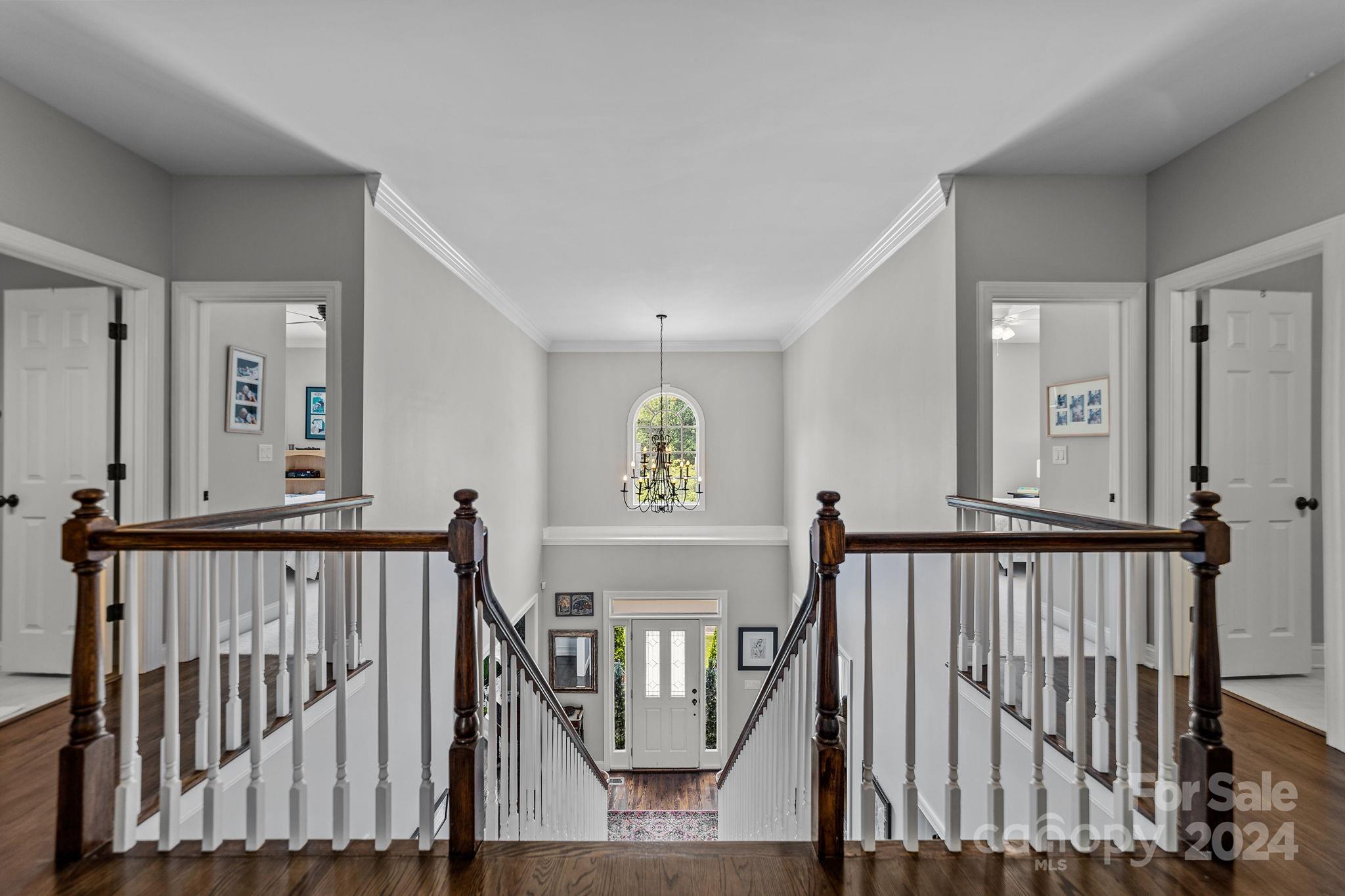 20443 Middletown Road Cornelius, NC 28031 - Photo 19 of 31 a view of staircase with railing and a rug
