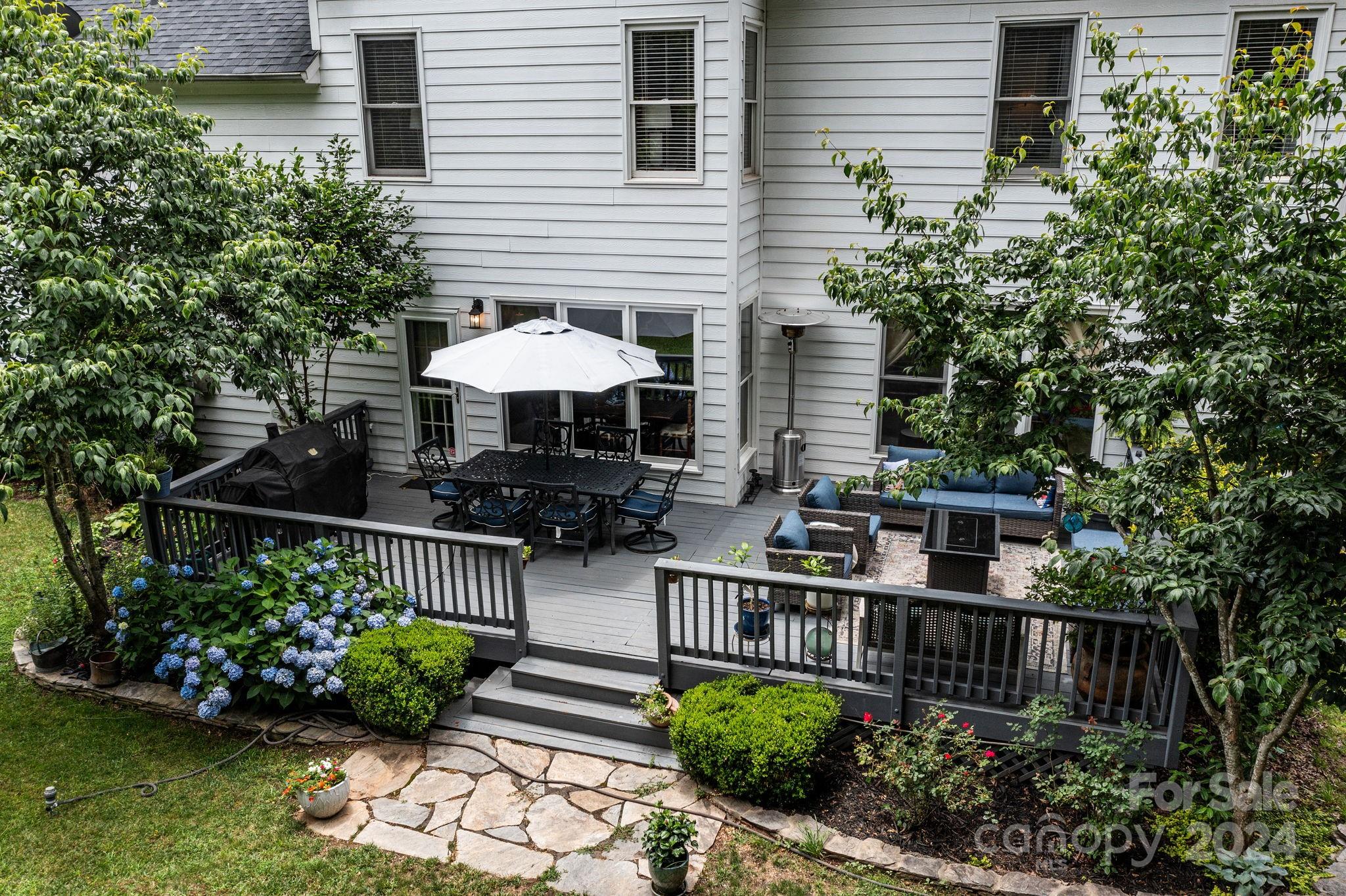 20443 Middletown Road Cornelius, NC 28031 - Photo 2 of 31 a view of a chair and table on the patio
