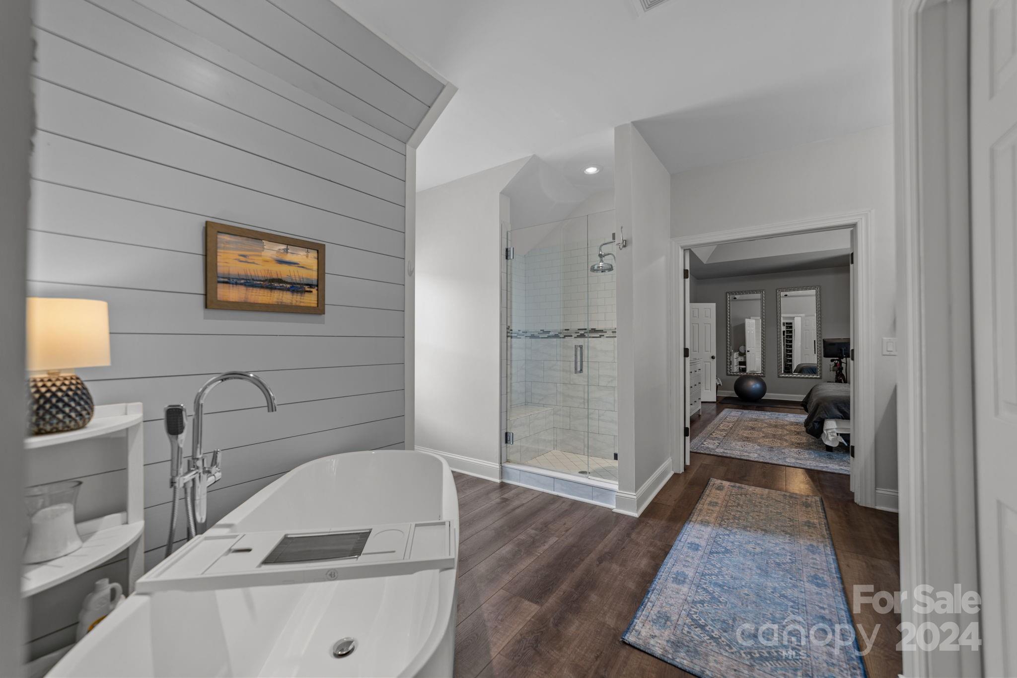 20443 Middletown Road Cornelius, NC 28031 - Photo 23 of 31 a bathroom with a tub sink and shower