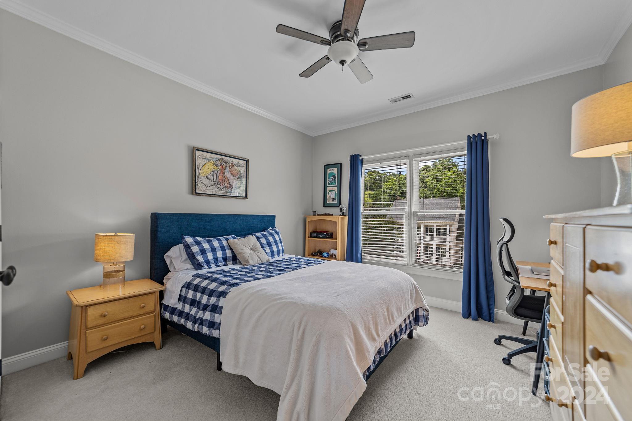 20443 Middletown Road Cornelius, NC 28031 - Photo 28 of 31 a bedroom with bed and a large window