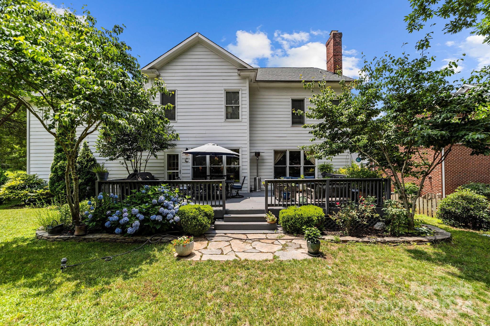 20443 Middletown Road Cornelius, NC 28031 - Photo 5 of 31 a view of house with backyard and garden