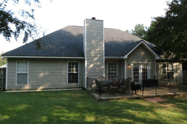 132 Deer Ridge Drive Lizella, GA 31052 - Photo 11 of 11 a front view of a house with a yard