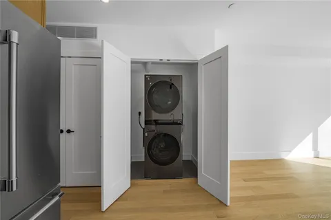 a view of living room washer and dryer