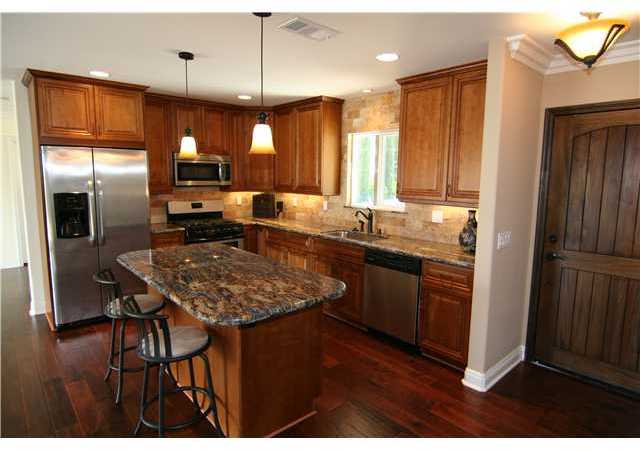 This home has the feel of a very expensive custom home with the size and the charm of a California Craftsman Cottage.
