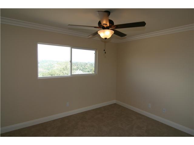 2265 Aqua Hill Road Fallbrook, CA 92028 - Photo 17 of 20 All bedrooms are equipped with ceiling fans that are double switched at the door for both light and fan. Every bedroom has views to the east and all will enjoy beautiful sunrises over the hills of Fallbrook.