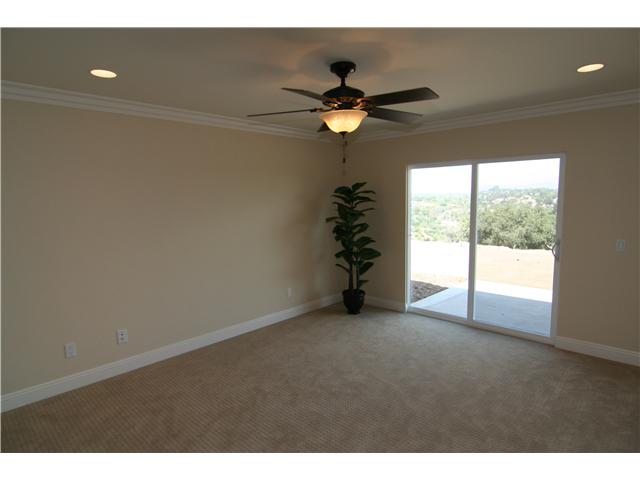 2265 Aqua Hill Road Fallbrook, CA 92028 - Photo 19 of 20 Master has patio just outside the sliding door for enjoyment of views to the east and make for a wonderful place to enjoy your morning cup of coffee. Also not seen in the photo is a full sized walk in closet on the west side of the room.