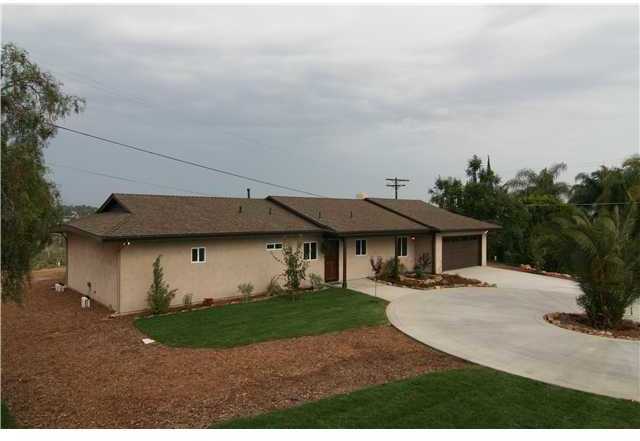 2265 Aqua Hill Road Fallbrook, CA 92028 - Photo 7 of 20 Home has been remodeled to be extremely energy efficient. There are only small windows on the West side of the home with all of the big views and windows on the east side of the home.