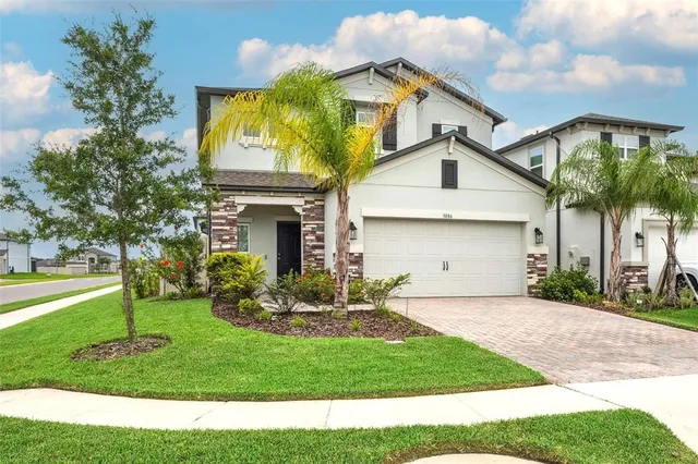 a front view of house with yard