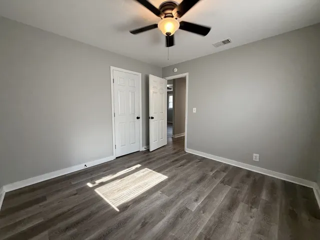 a view of an empty room and window