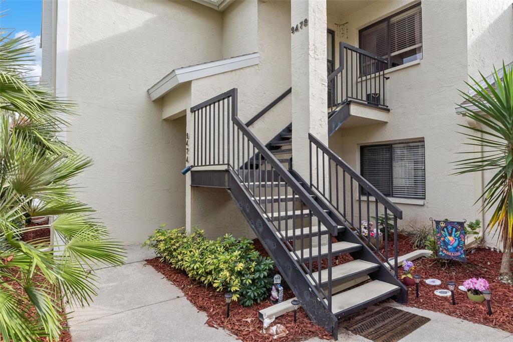 9474 Nakoma Way, Unit E Weeki Wachee, FL 34613 - Photo 2 of 31 a view of entryway with a front door