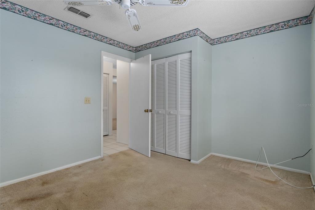 9474 Nakoma Way, Unit E Weeki Wachee, FL 34613 - Photo 24 of 31 a view of an empty room