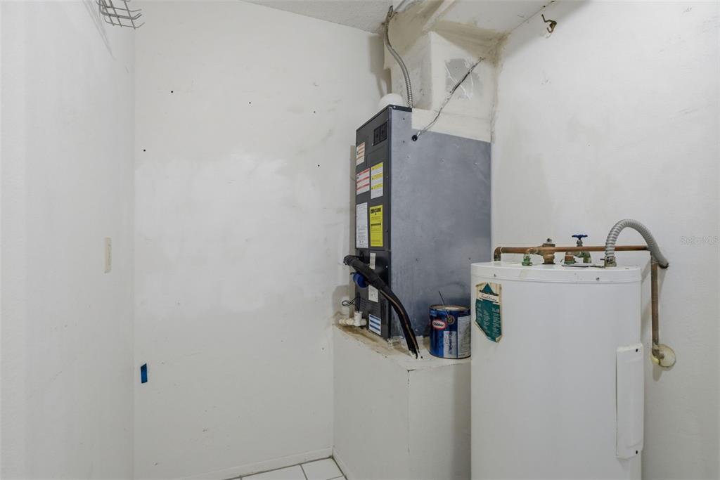 9474 Nakoma Way, Unit E Weeki Wachee, FL 34613 - Photo 28 of 31 a close view of utility room