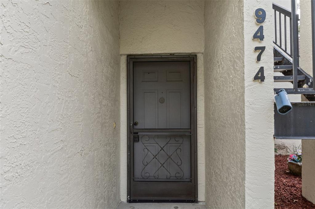 9474 Nakoma Way, Unit E Weeki Wachee, FL 34613 - Photo 4 of 31 a view of front door