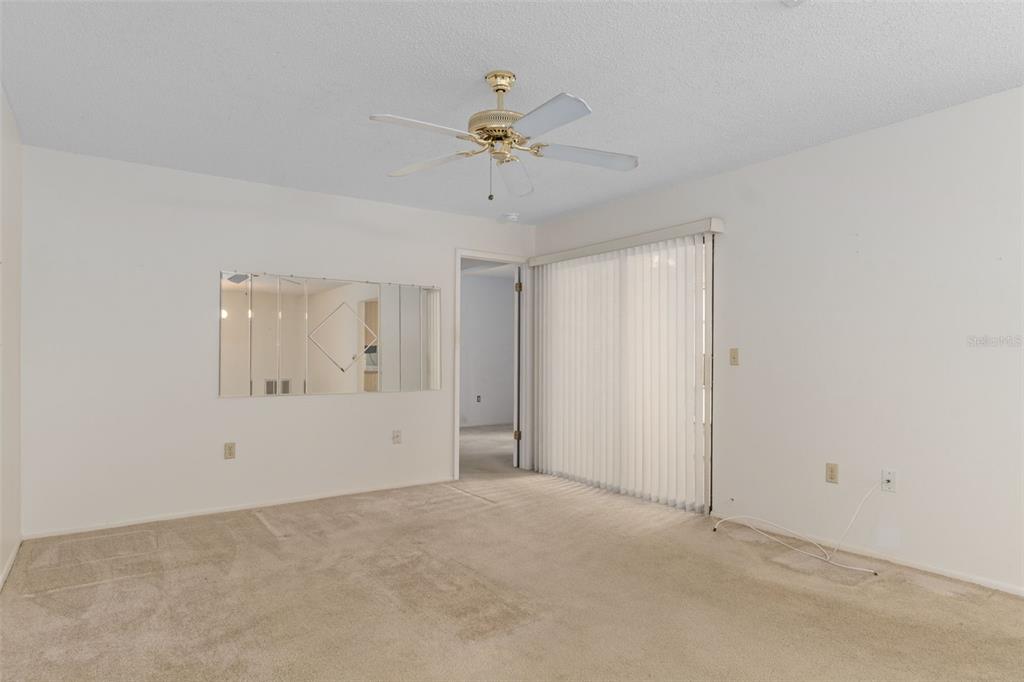 9474 Nakoma Way, Unit E Weeki Wachee, FL 34613 - Photo 7 of 31 a view of an empty room