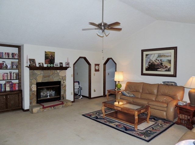 5759 Zebulon Road Macon, GA 31210 - Photo 3 of 11 a living room with furniture a window and a fireplace