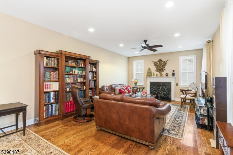 3 Marble Lane Randolph, NJ 07869 - Photo 11 of 46 a living room with furniture and a wooden floor