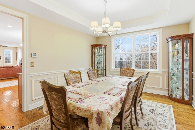 3 Marble Lane Randolph, NJ 07869 - Photo 20 of 46 a view of a dining room with furniture wooden floor and chandelier