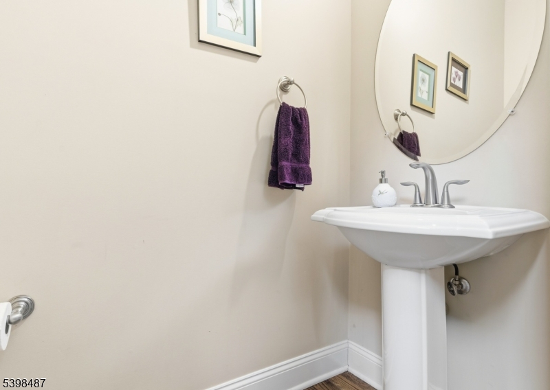 3 Marble Lane Randolph, NJ 07869 - Photo 23 of 46 a bathroom with a sink and a mirror