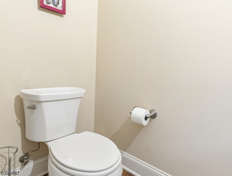 3 Marble Lane Randolph, NJ 07869 - Photo 25 of 46 a white toilet sitting next to a white wall
