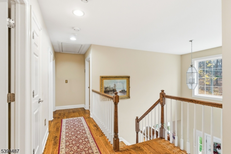 3 Marble Lane Randolph, NJ 07869 - Photo 27 of 46 a view of a hallway with window and stairs
