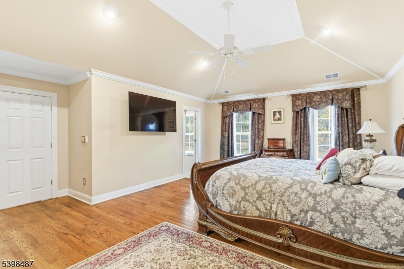 3 Marble Lane Randolph, NJ 07869 - Photo 29 of 46 a living room with a bed furniture and a flat screen tv