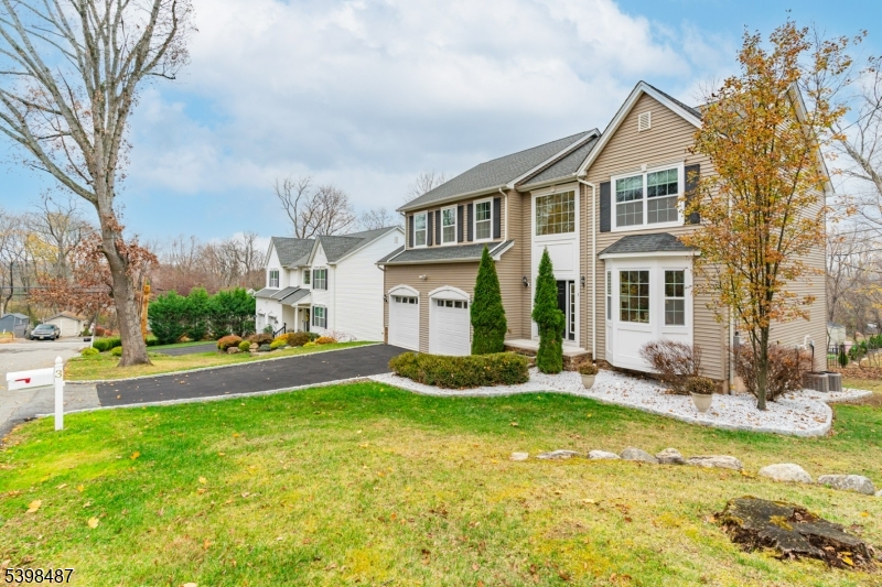 3 Marble Lane Randolph, NJ 07869 - Photo 3 of 46 a front view of a house with a yard