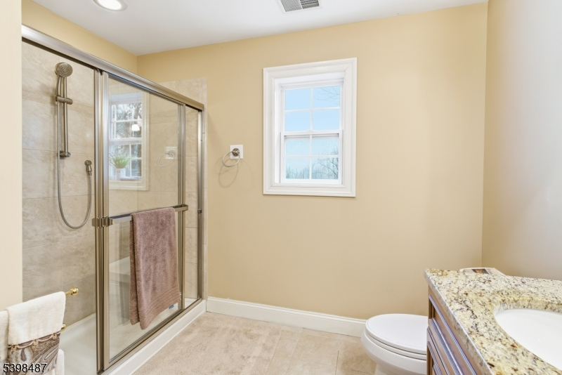 3 Marble Lane Randolph, NJ 07869 - Photo 33 of 46 a bathroom with a granite countertop sink toilet and shower