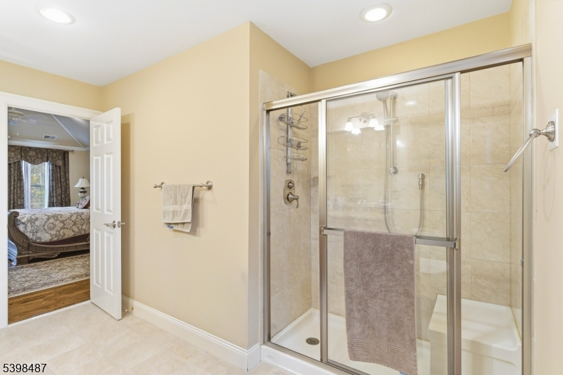 3 Marble Lane Randolph, NJ 07869 - Photo 34 of 46 a bathroom with a glass shower door and a sink