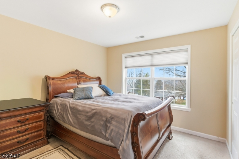 3 Marble Lane Randolph, NJ 07869 - Photo 36 of 46 a bedroom with a bed and a window