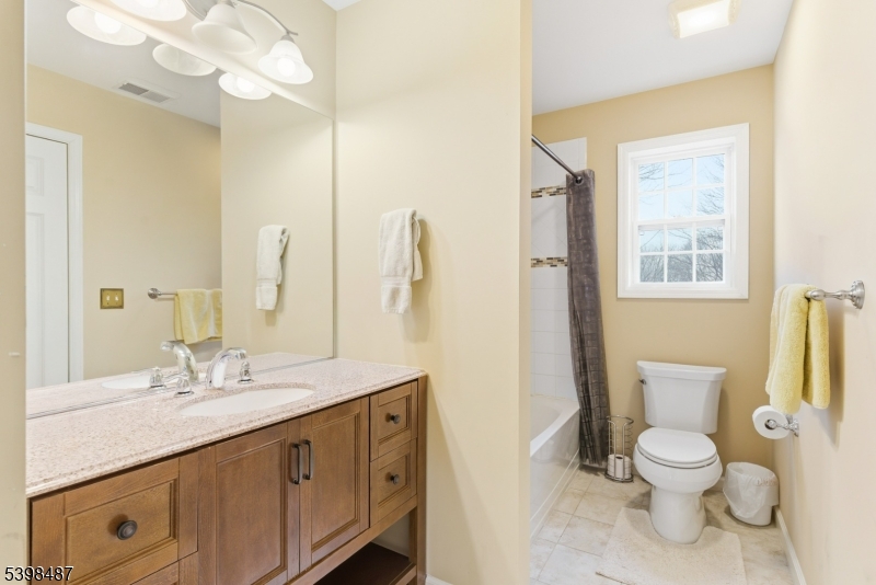 3 Marble Lane Randolph, NJ 07869 - Photo 38 of 46 a bathroom with a granite countertop toilet sink and a mirror