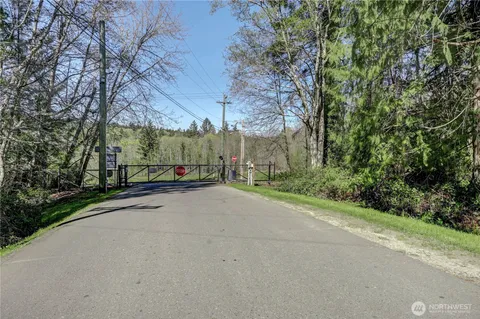 a view of a street with a building in the background