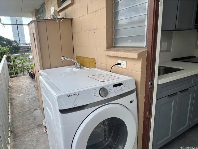 a utility room with dryer and washer