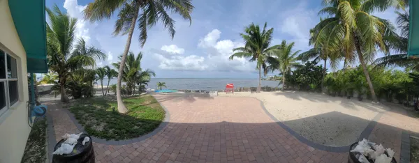 a view of a backyard with a patio