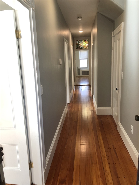 203 High Street Brookline, MA 02445 - Photo 9 of 18 a view of gallery with wooden floor