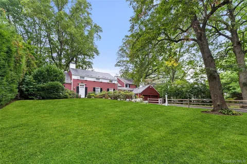a view of a house with a big yard