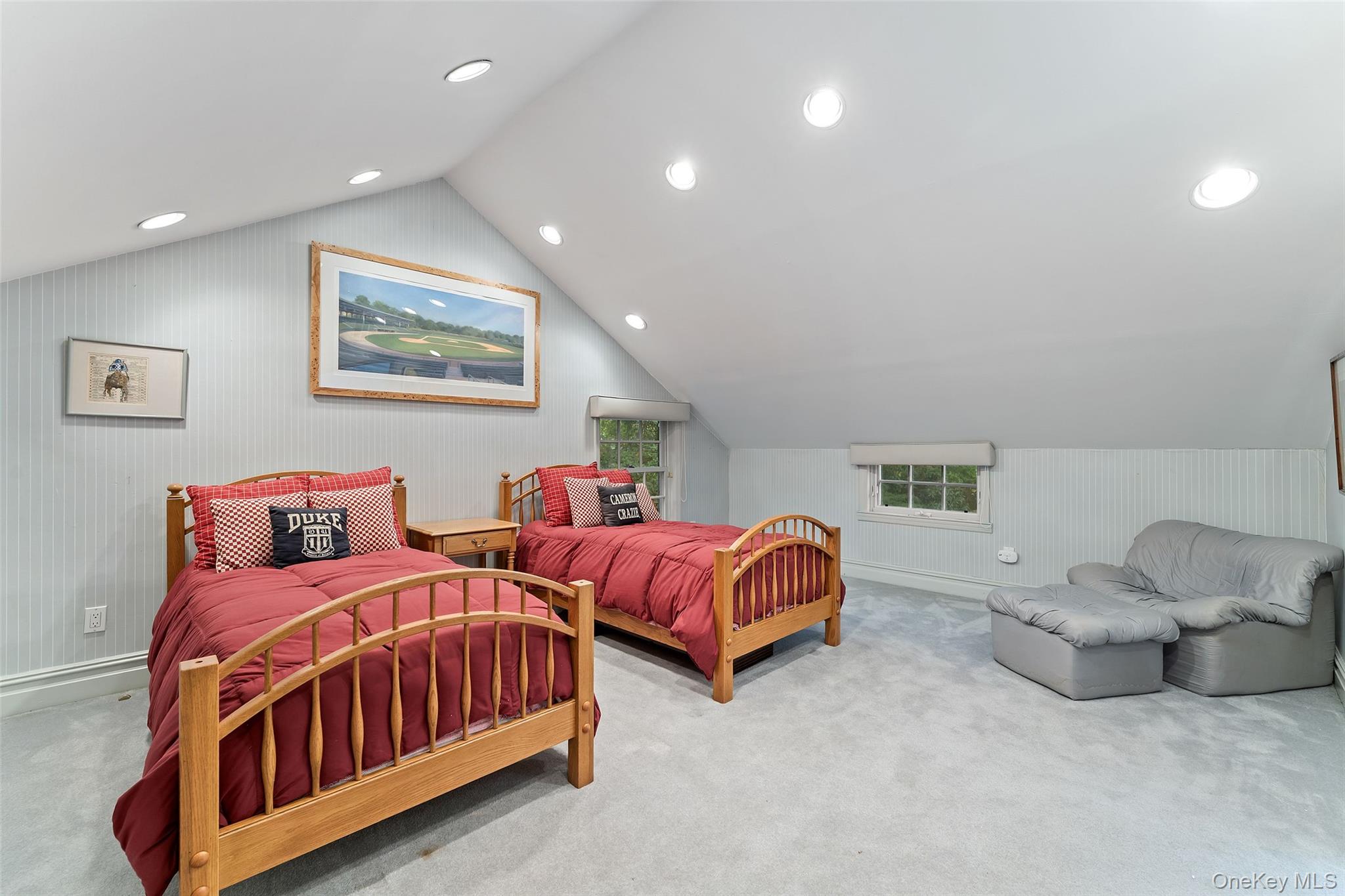 126 Penn Road Scarsdale, NY 10583 - Photo 23 of 34 a bedroom with two beds and painting on the wall