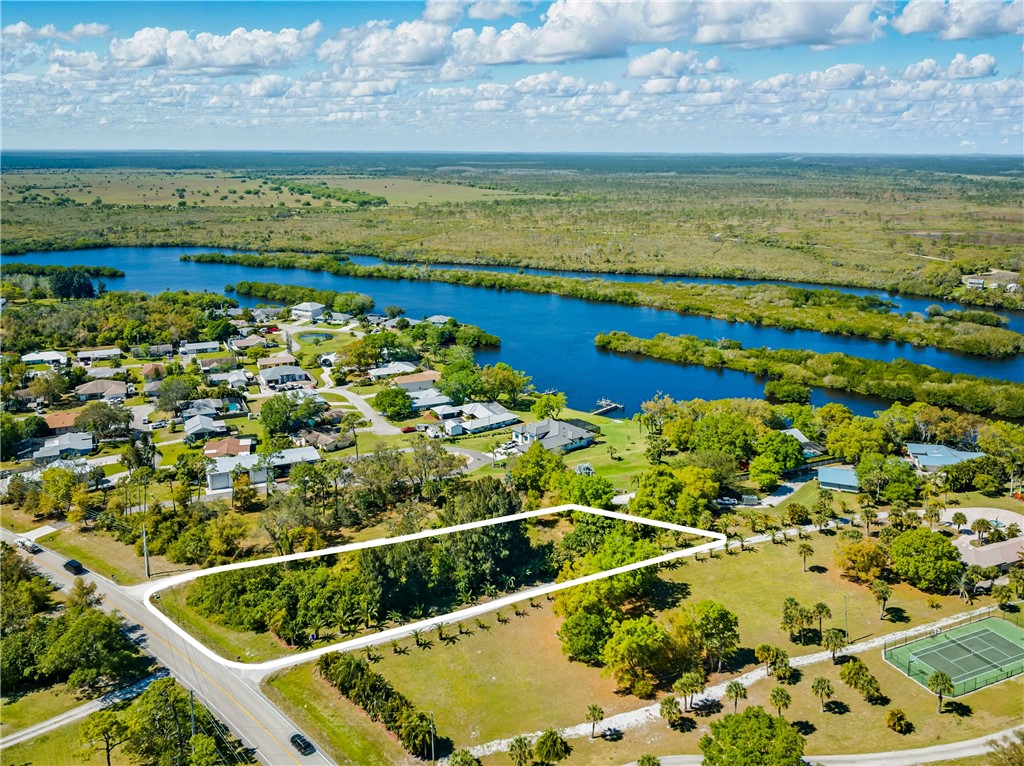 12405 Roseland Road Sebastian, FL 32958 - Photo 1 of 11 a view of an outdoor space and a lake view